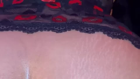 Black curvy woman spreads wide on bed, oily ass close-up