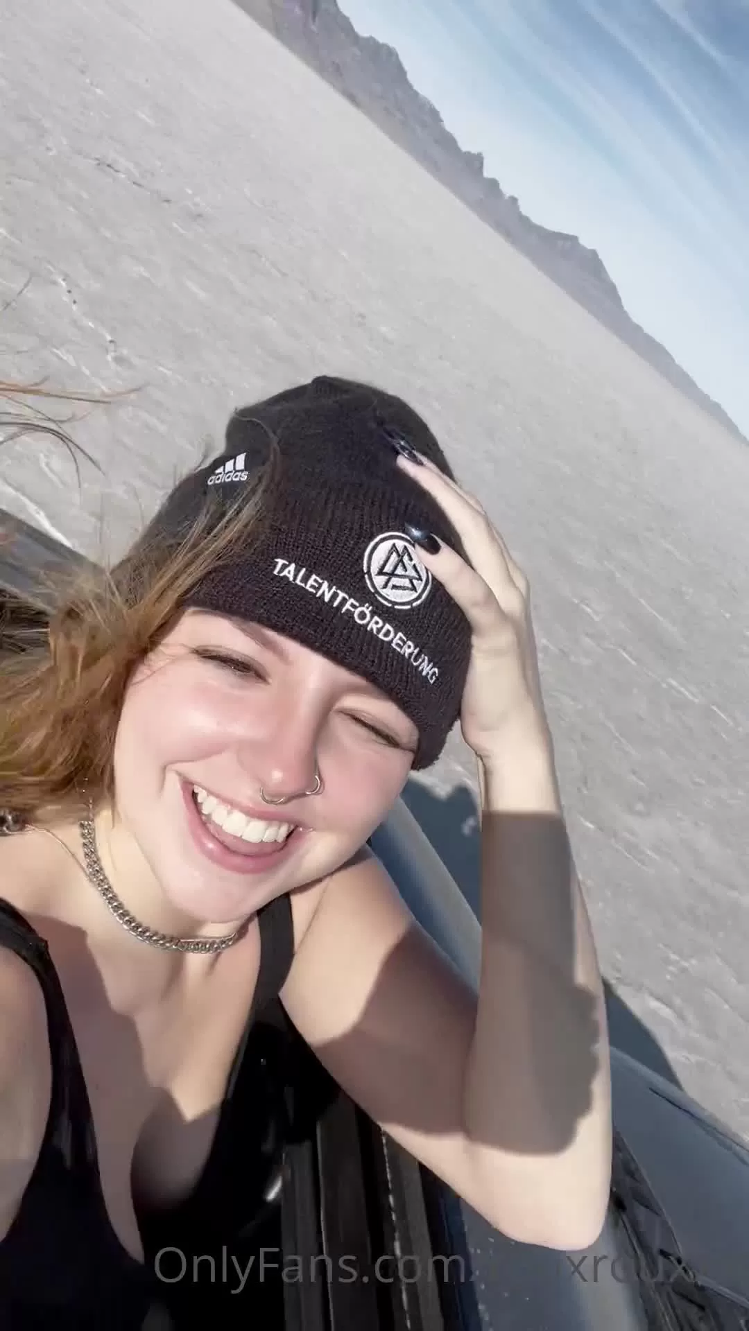 Smiling Woman with Septum Piercing in Desert Salt Flat Selfie