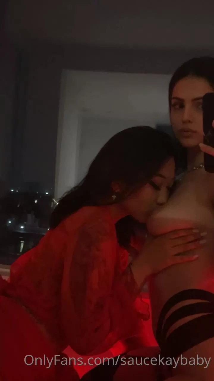 Two Women in Red Lace and Black Lingerie Intimate Moments