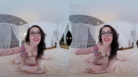 Petite brunette with glasses gives blowjob and exposes herself on bed