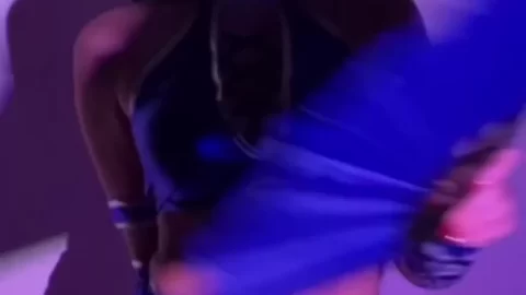 Dark Haired Cosplayer in Blue and Silver Mortal Kombat Kitana Outfit