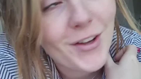 Slim Blonde with Dreadlocks and Septum Piercing Smiling Close-Up