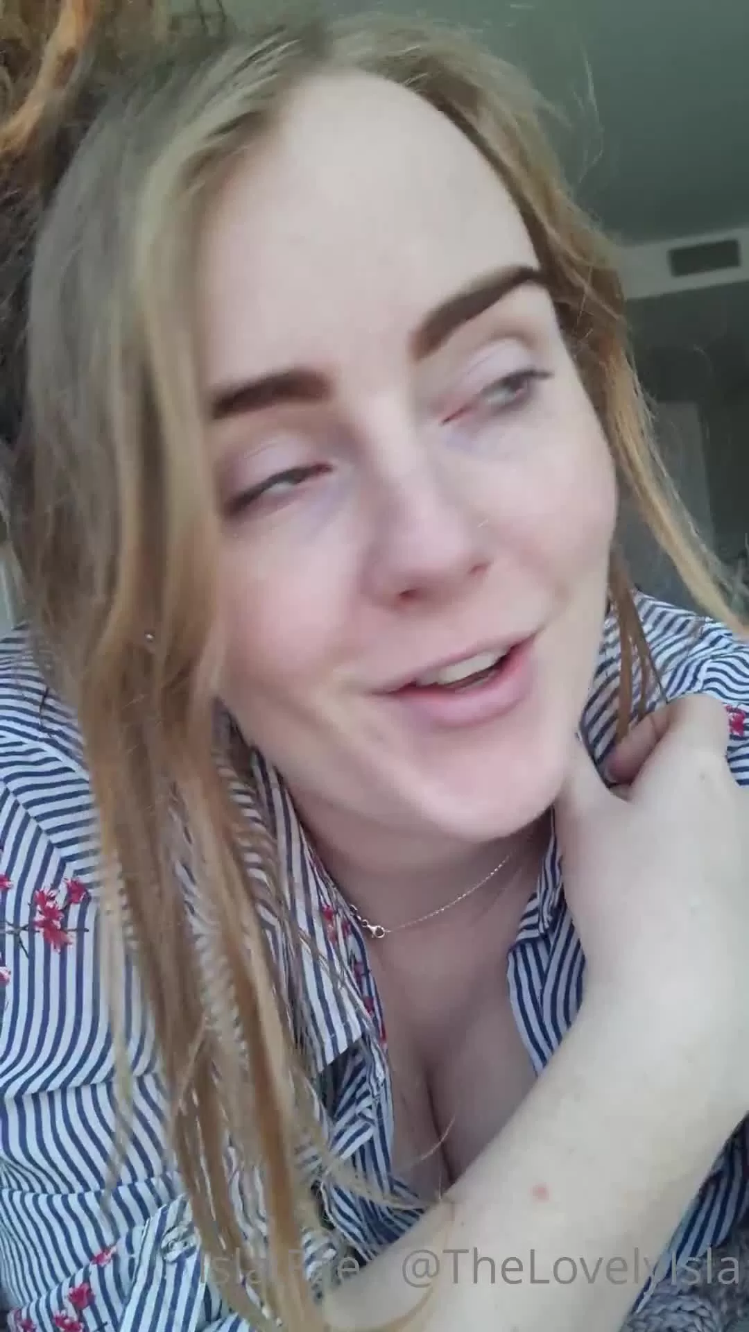 Slim Blonde with Dreadlocks and Septum Piercing Smiling Close-Up