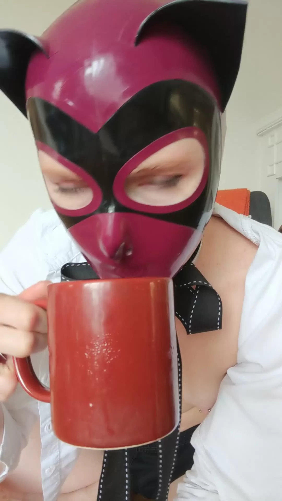 Redhead in Purple Latex Cat Mask and White Shirt POV