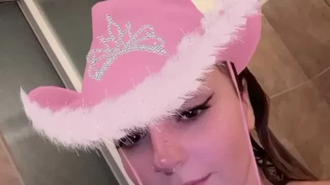 Freckled Beauty in Pink Cowboy Hat Selfie