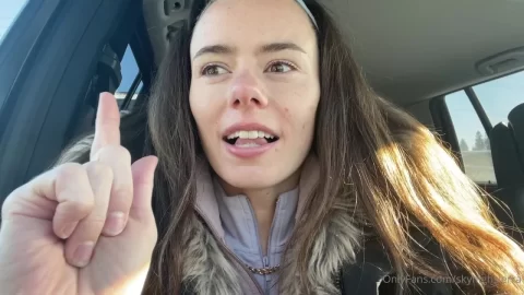 Natural Beauty in Winter Gear Selfie Video Inside a Car