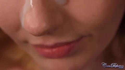 Brunette milf gives sloppy blowjob on living room couch