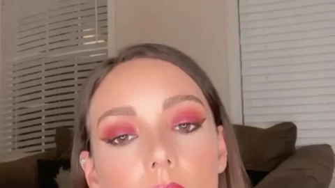 Stunning Brunette in Sheer Star Bra Posing on Brown Couch