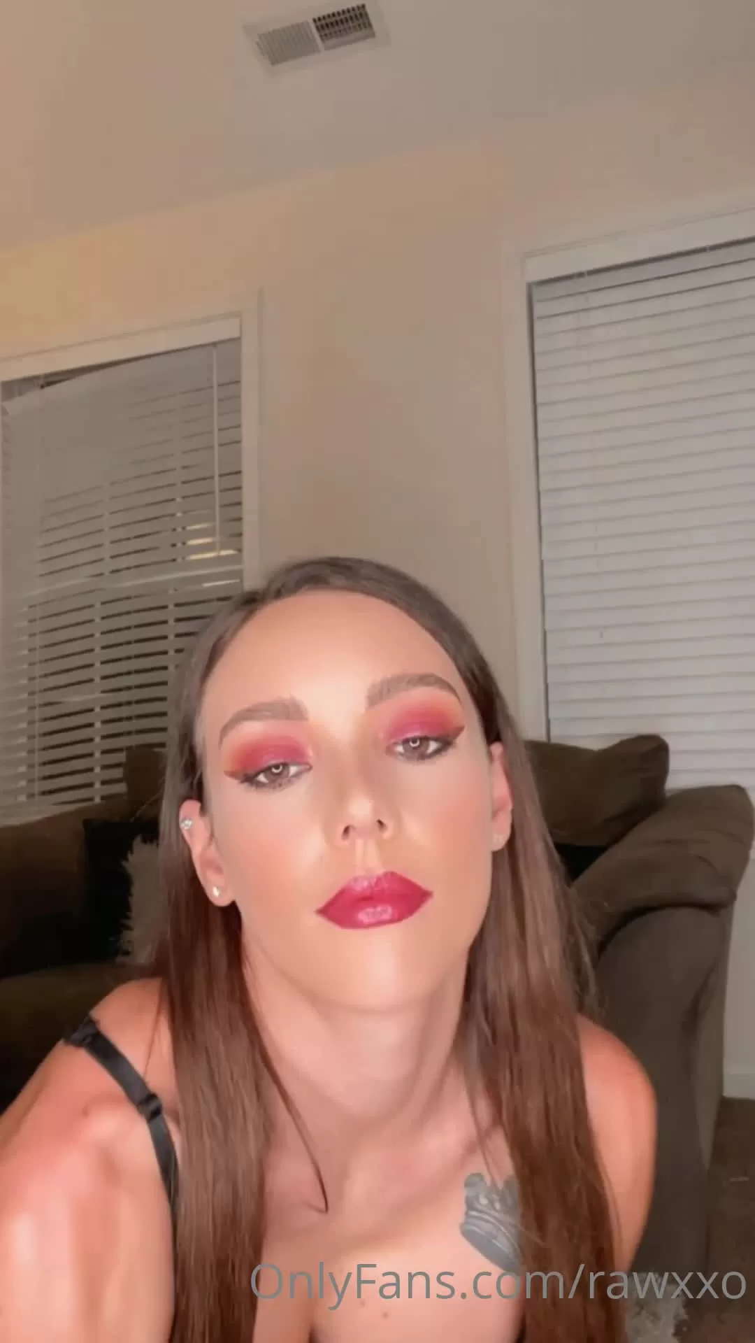 Stunning Brunette in Sheer Star Bra Posing on Brown Couch