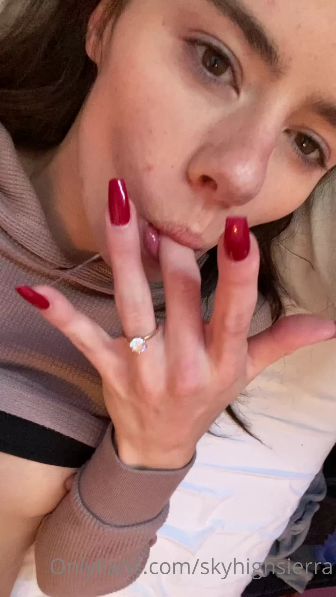 Brunette with Red Nails Jerks Off Guy in Bedroom POV