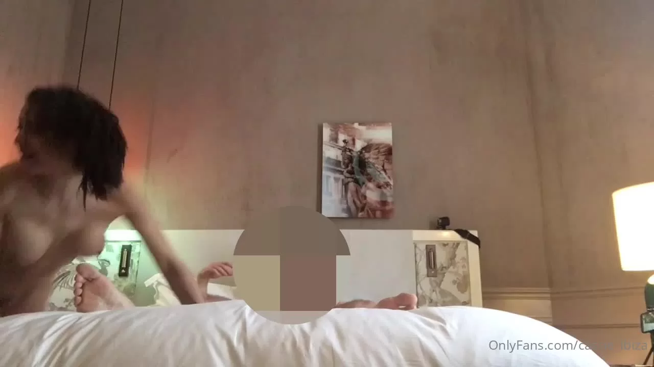 Slender Brunette on Top in Bedroom Setting