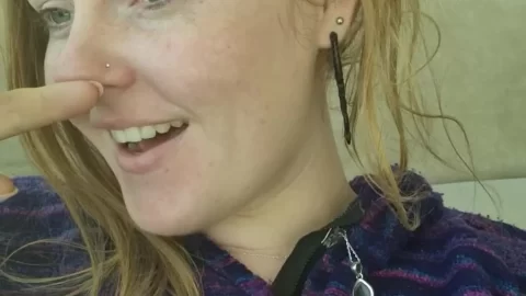 Freckled Beauty in Hoodie Shows Off Playful Smile & Piercing