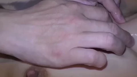 Two Asian women and one man go at it in bedroom with white sheets