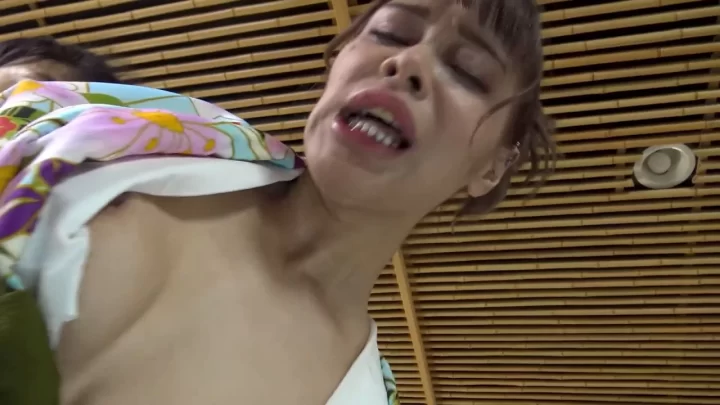 Two Asian girls fuck in traditional room with kimono