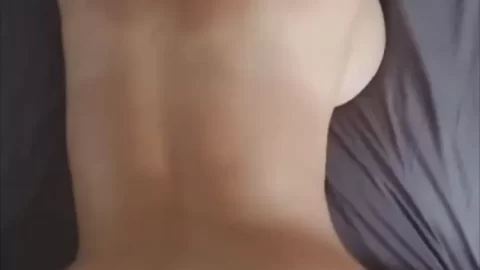 Brunette milf takes it from behind while getting head on bed