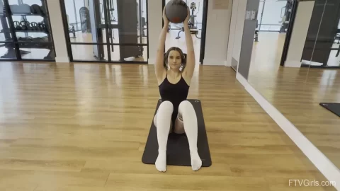 Brunette Slim Girl Workout Strip at Gym with Butterfly Back Tattoo
