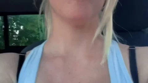 Blonde milf flashes big tits in car, nipples out whole time