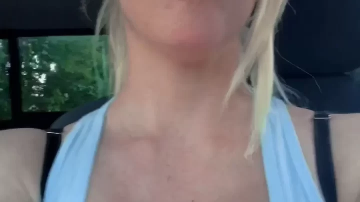 Blonde milf flashes big tits in car, nipples out whole time