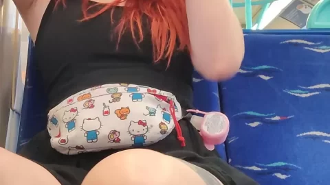 Redhead Fashion in Motion: Stylish Urban Transit Look