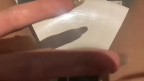 Slim White Girl Fingers Herself in Bathroom