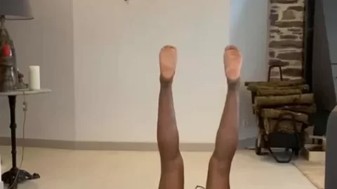 Black woman in yoga poses gets naked