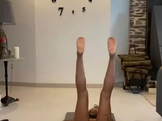 Black woman in yoga poses gets naked