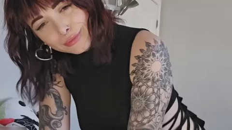 Brunette with Tattoos and Nose Piercing Gets Intimate
