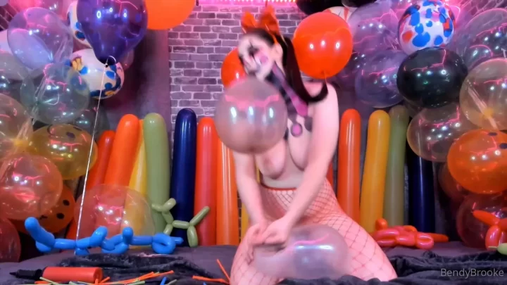 Curvy Brunette in Clown Makeup Gets Naked