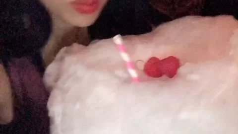 Asian Girl Licks Cotton Candy