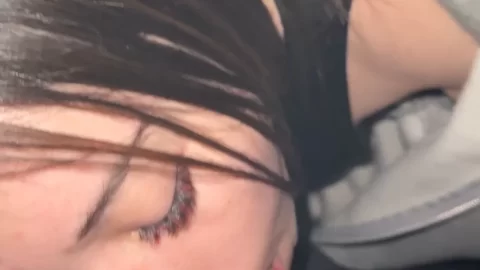 Brunette girl gives blowjob on bed