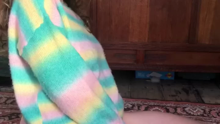 Petite white brunette sits on rug, no underwear