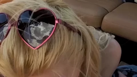 Blonde girl gives oral on a boat