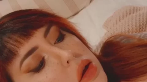 Redhead Girl Plays with Herself on Bed