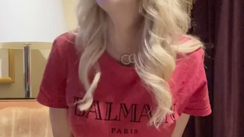 Blonde MILF in living room solo
