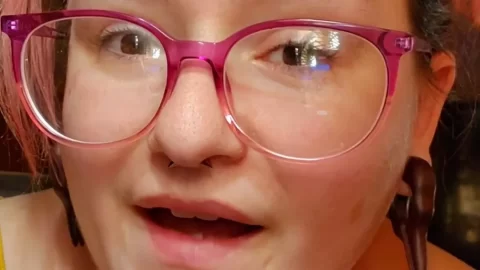 Redhead girl with tattoo fucks herself in bathroom