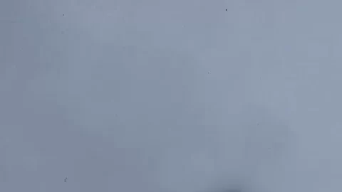 Slim girl walks barefoot in snow