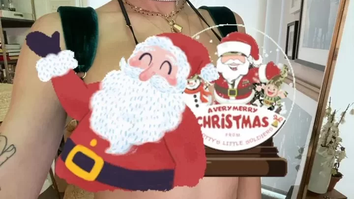Dark Haired Middle Eastern Girl Plays with Christmas Decor