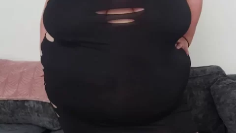 Mature brunette in black dress gets up close and personal