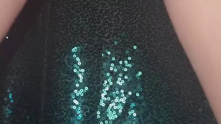Slim 20s girl plays with sparkly fabric