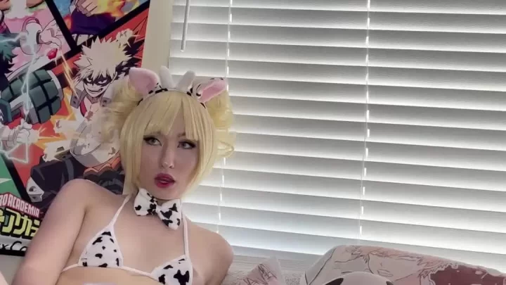 Blonde teen with cow ears fucks herself on bed