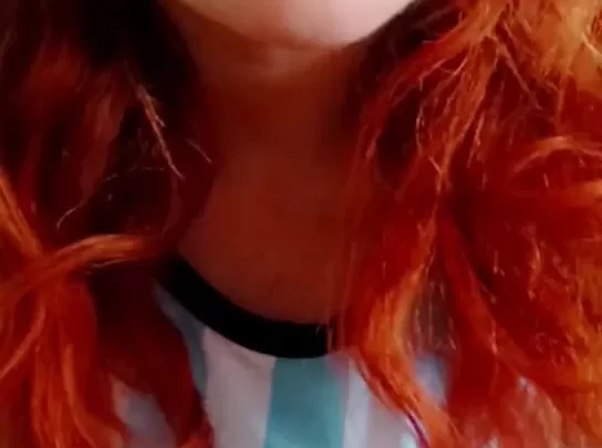 Redhead in underwear poses indoor