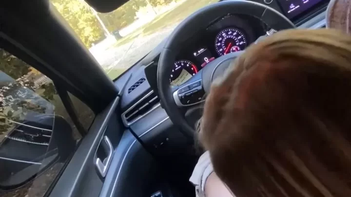 Blonde girl drives while jerking off passenger