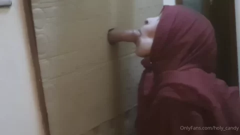Slim White Girl with Hijab Gives Dildo BJ in Bathroom