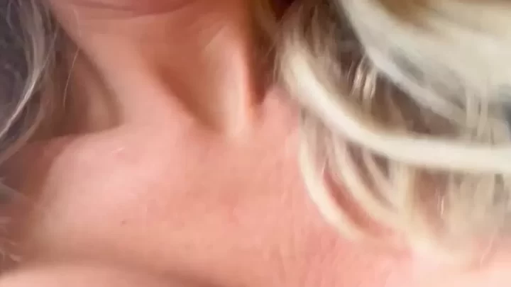 Blonde girl plays with her tits