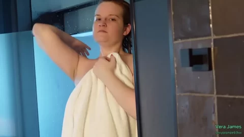Blonde and brunette girls get wet