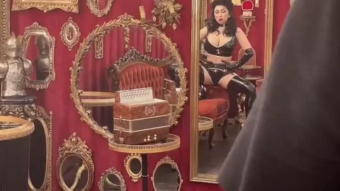 Asian girl in black leather fucks guy