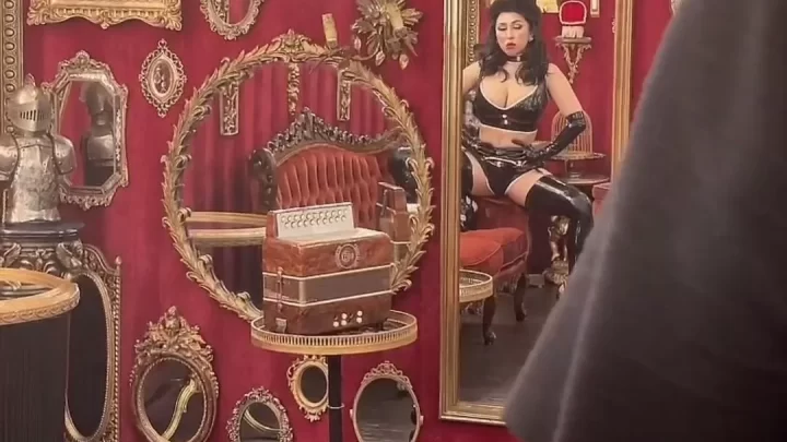 Asian girl in black leather fucks guy