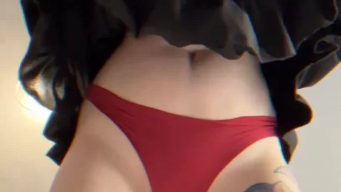 Blonde girl in red underwear lifts black dress