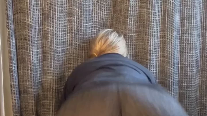 Blonde bends over in bathroom