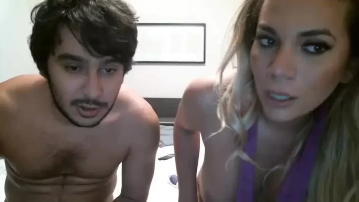 Blonde girl gets intimate with two guys in bedroom